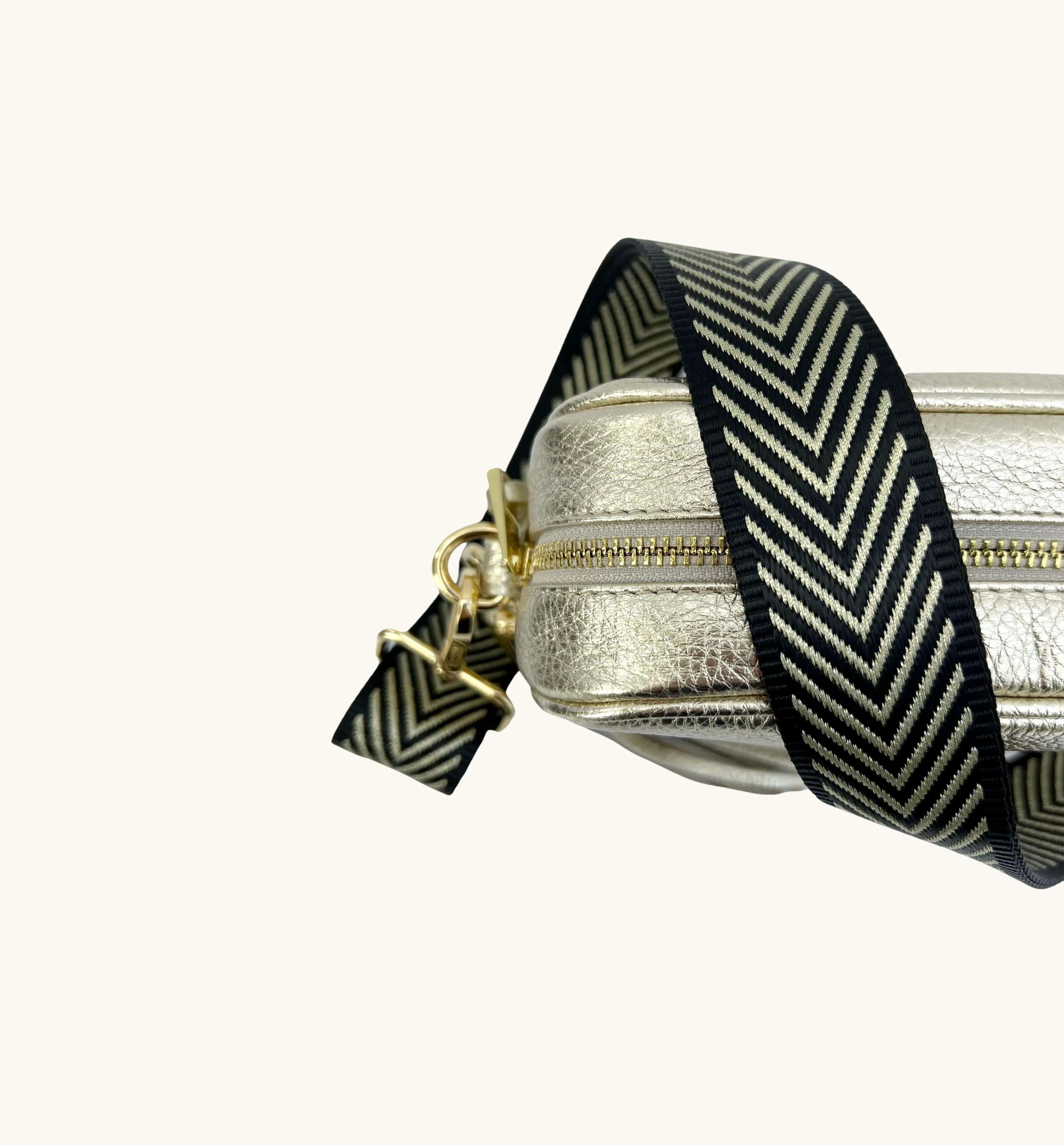 The Tassel Gold Leather Crossbody Bag With Black & Gold Chevron Strap