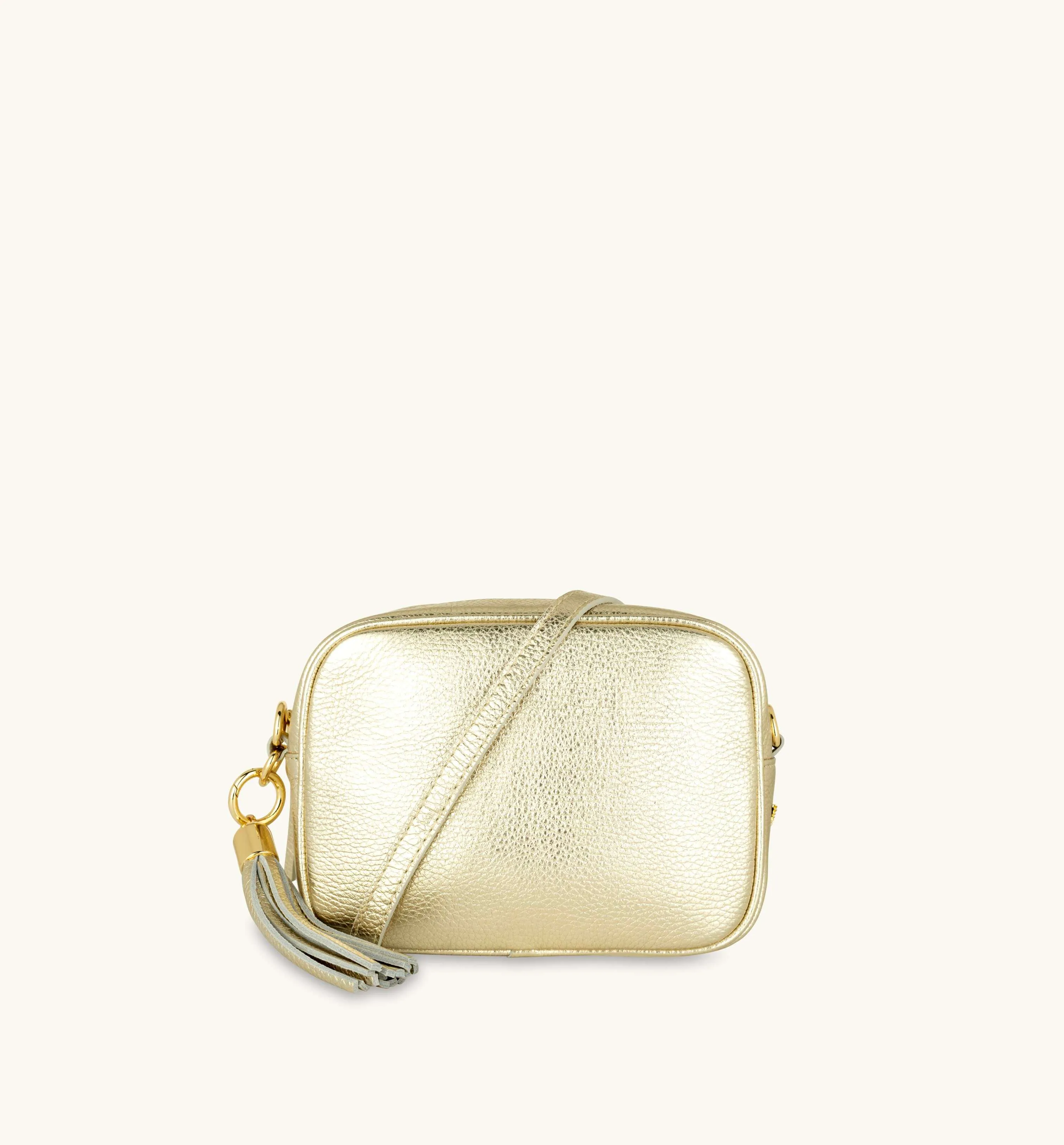 The Tassel Gold Leather Crossbody Bag With Black & Gold Chevron Strap